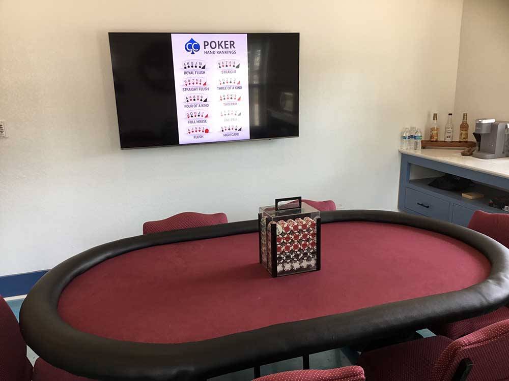 A poker table inside the dining area at HIDDEN LAKE RV RESORT