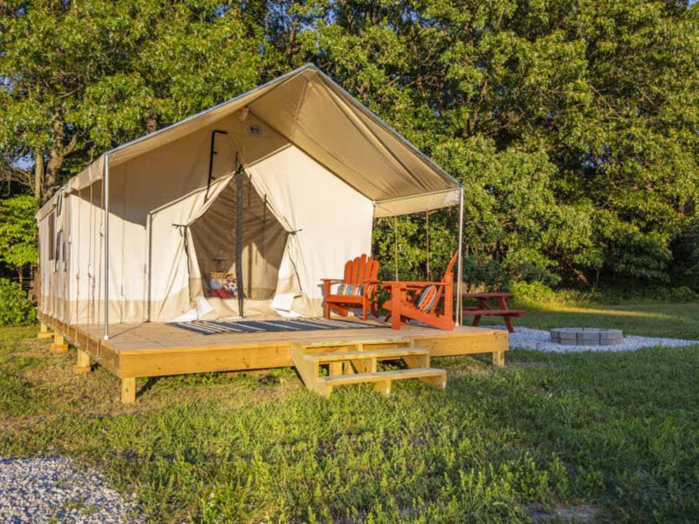 Sunshine hitting a glamping tent at ROARING RIVER HILLS CAMPGROUND AND CABINS
