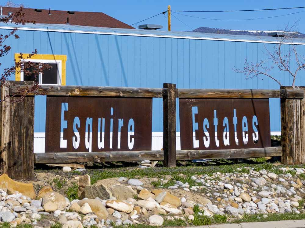 The front entrance sign at ESQUIRE ESTATES MH & RV PARK