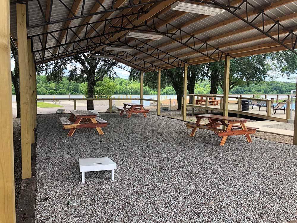 Picnic benches under the pavilion at BOTEL CAMPGROUND