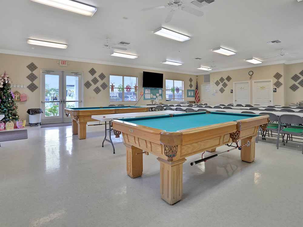 Pool tables inside the rec room at COACH HOUSE MOBILE HOME PARK