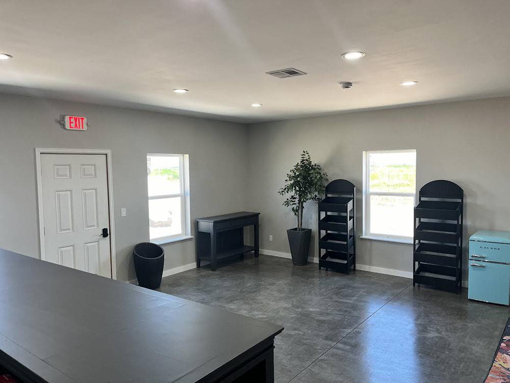 Office interior with black shelves at SAN LUIS VALLEY RV RESORT