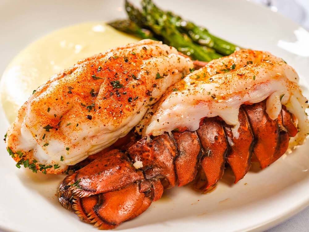 A plate of food with lobster tail at SPIRIT MOUNTAIN CASINO RV PARK