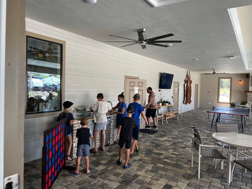 Guest enjoying some food at SANTA FE PALMS RV RESORT