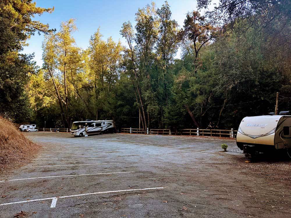 Motorhome and trailer backed in at paved sites at SARATOGA SPRINGS