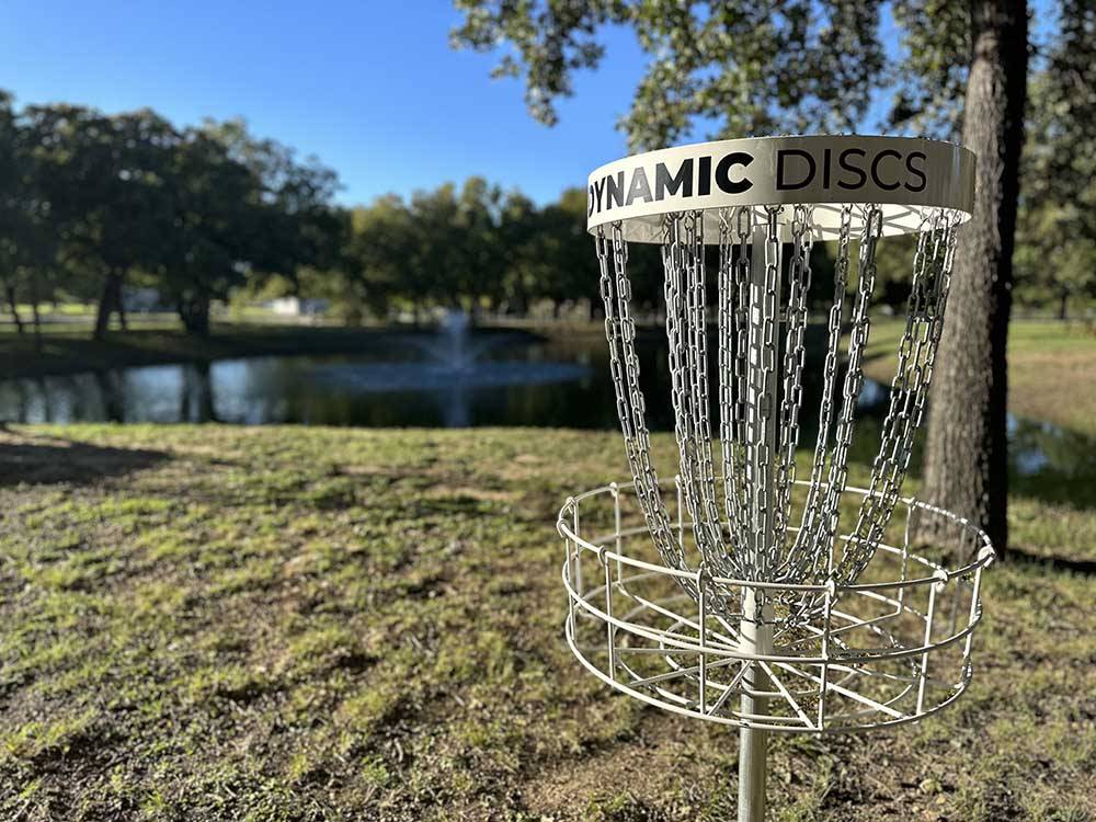 The disc golf next to the pond at STARRY NIGHT RV RESORT