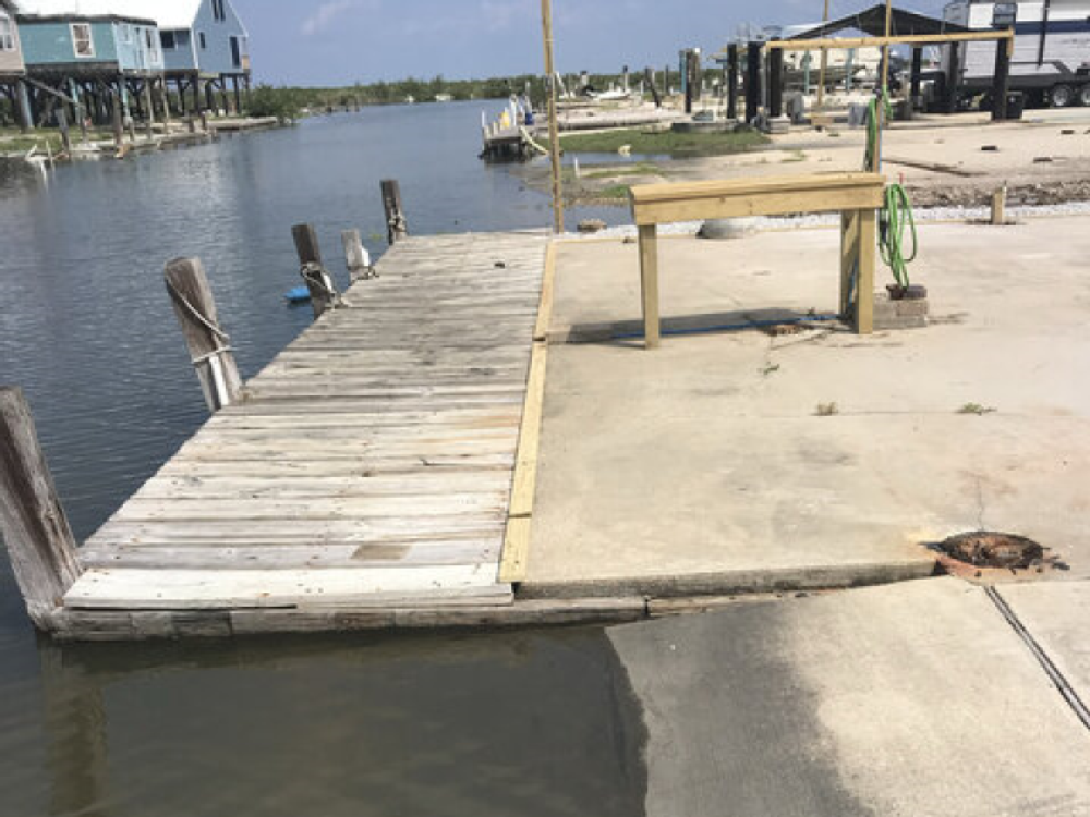 Wooden dock at Miles Away Properties