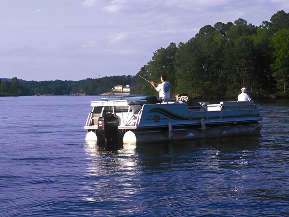 Boat on a lake at site Leisure Landing RV Park