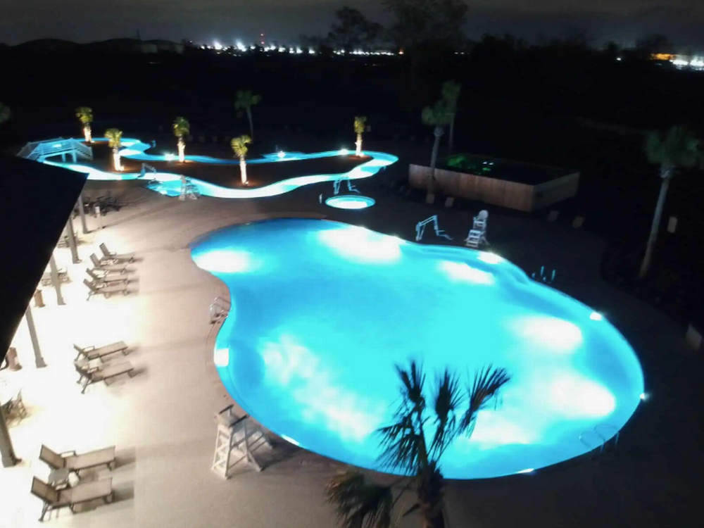 Pool at night Tiger's Trail RV Resort