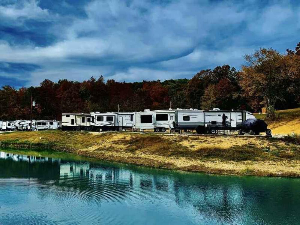 RVs by the water at Little Sinkin Creek RV Resort & UTV Campground