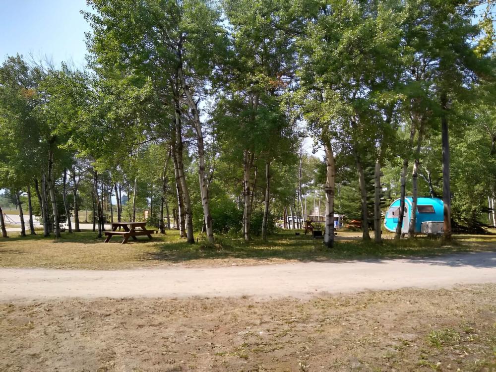 Parked trailer at Leaning Tree Cafe and Campground