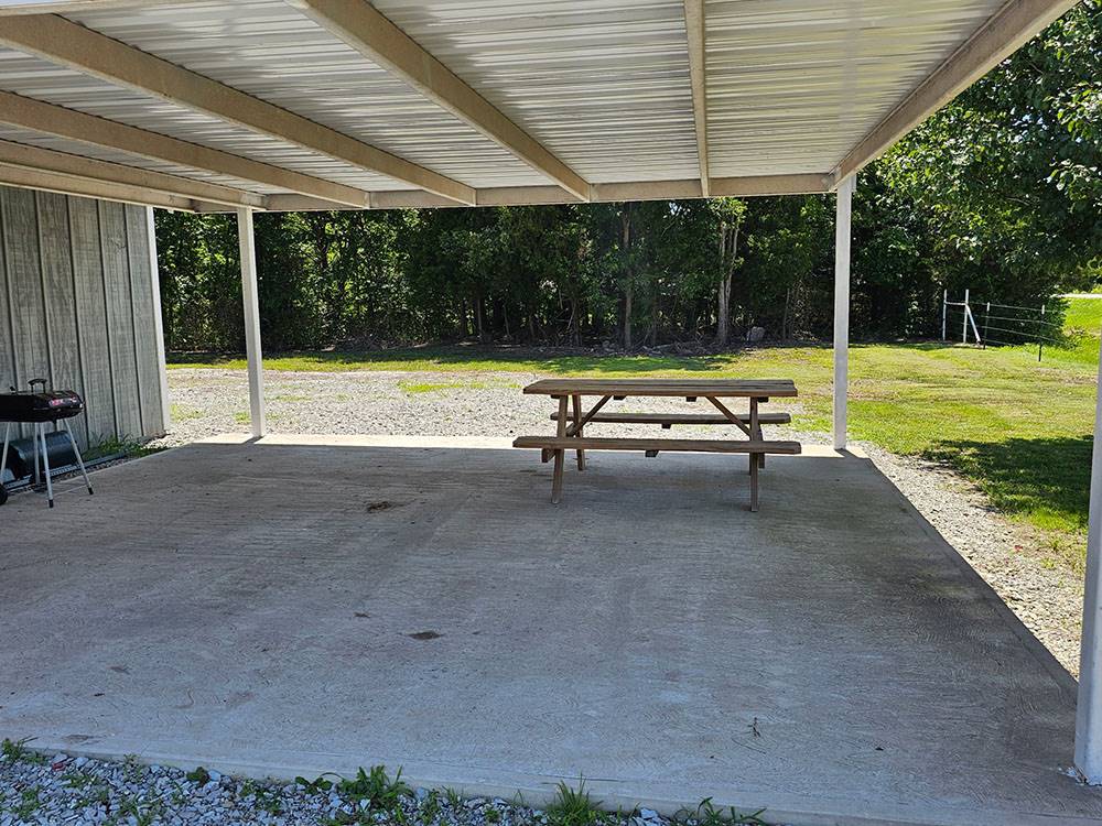 Covered seating area with picnic table