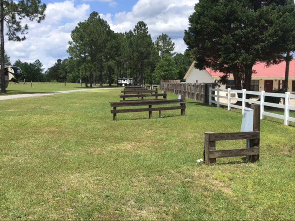Wood dividers between grass sites at 341 RV Park
