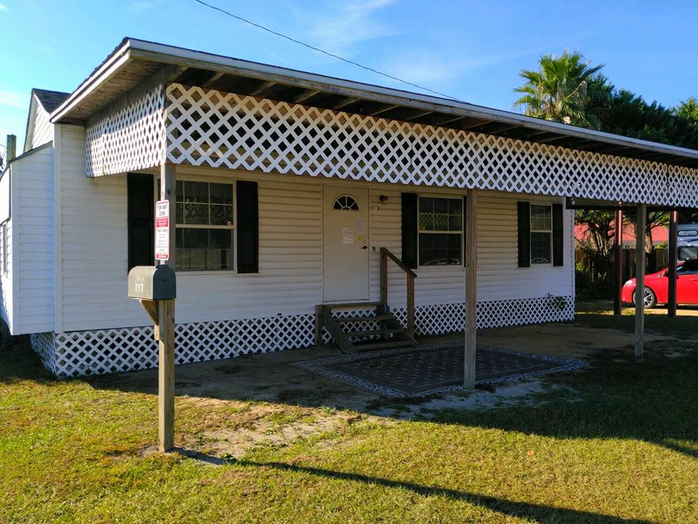 White building with custom awning at 341 RV Park