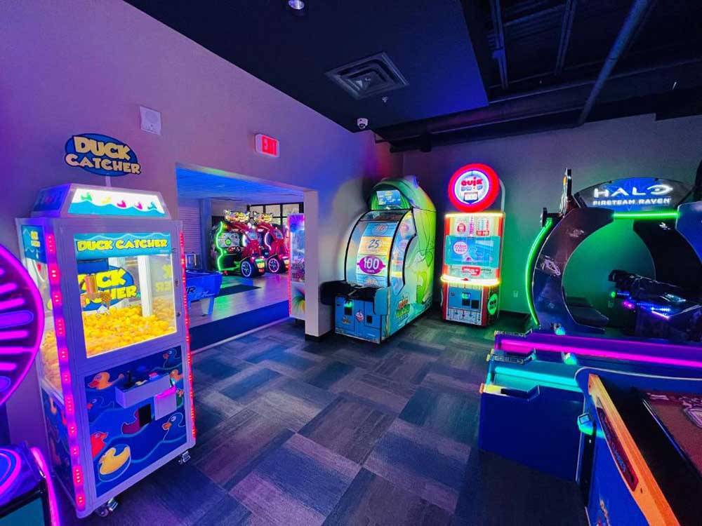 The arcade games all lit up at THE RV PARK 7 CLANS FIRST COUNCIL