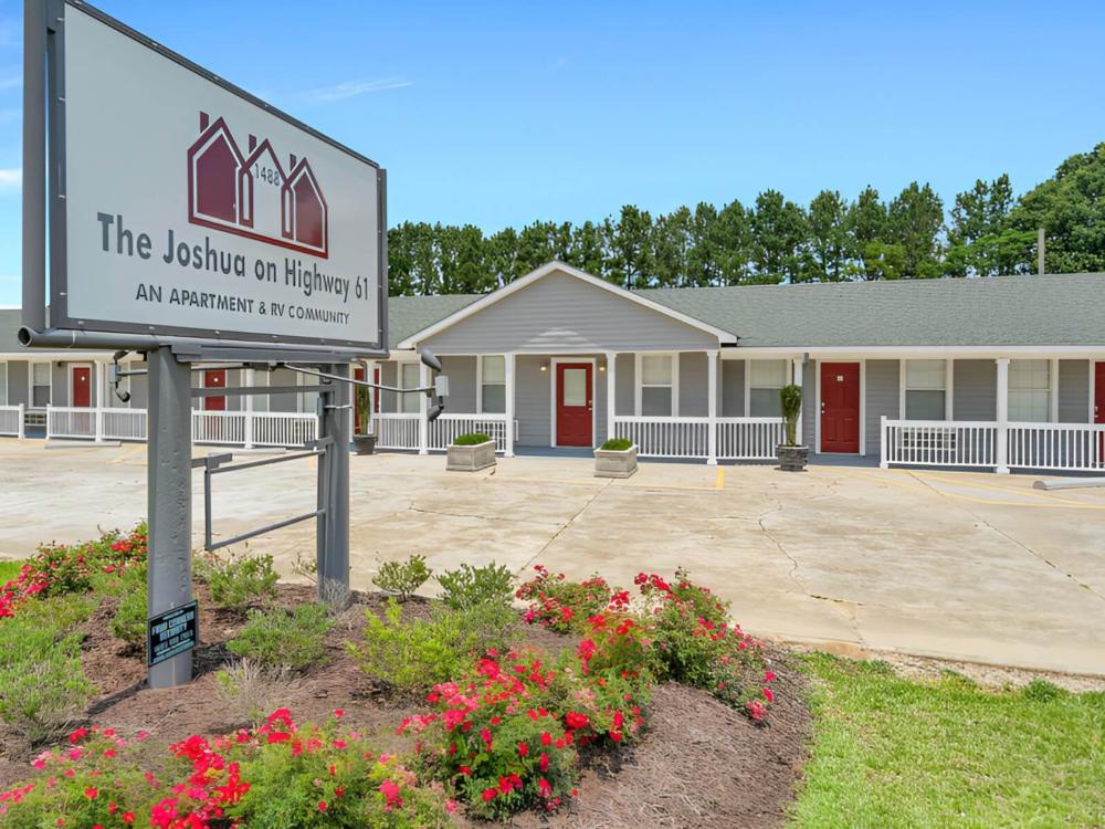 Welcome sign at The Joshua on HWY 61