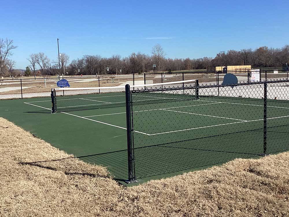 The tennis ball courts at RIVERFRONT RV RESORT