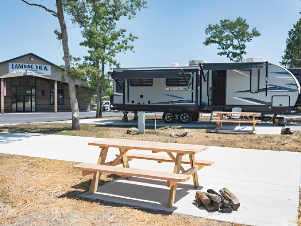 Panic table with parked trailer at Landing View Campground