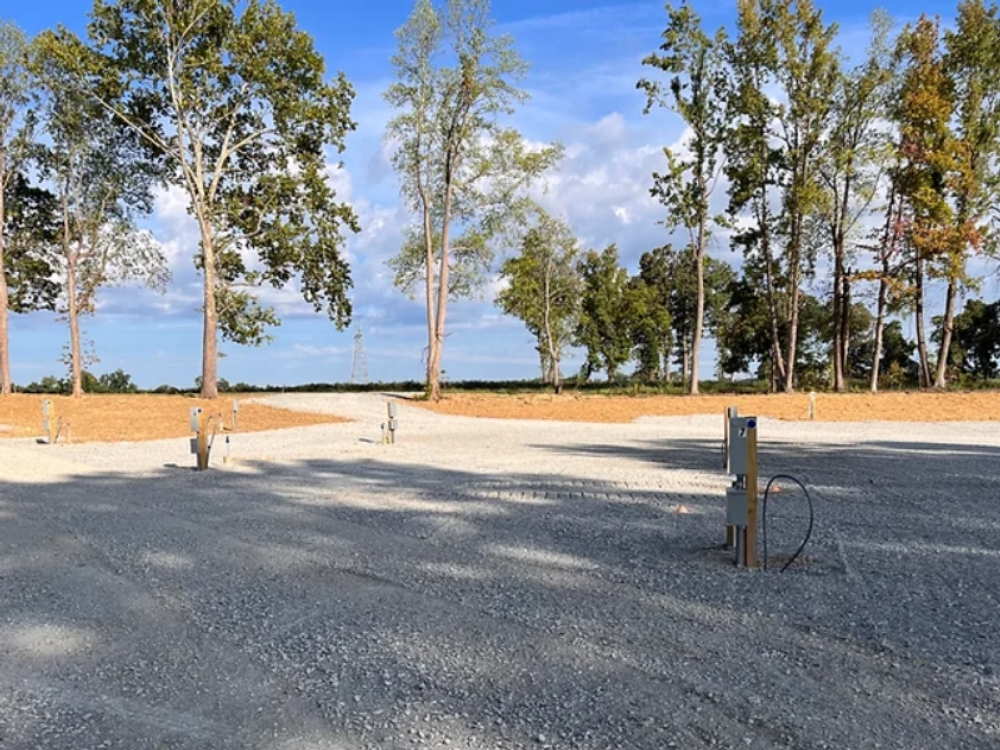 Gravel sites with hookups at Hidden Acres RV Park