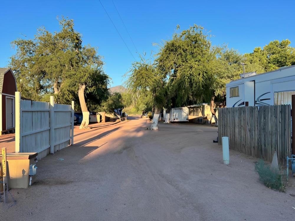Office with wagon and haystacks at Jakes Corner RV Park
