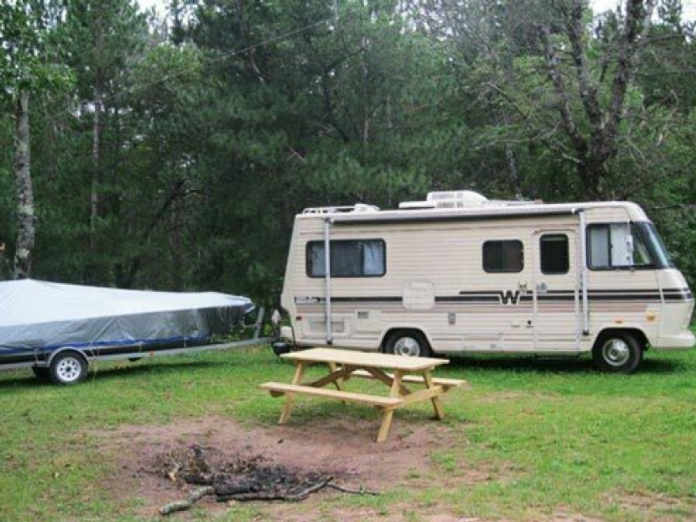 RV and picnic table at Thornton's Rafting Resort and Campground