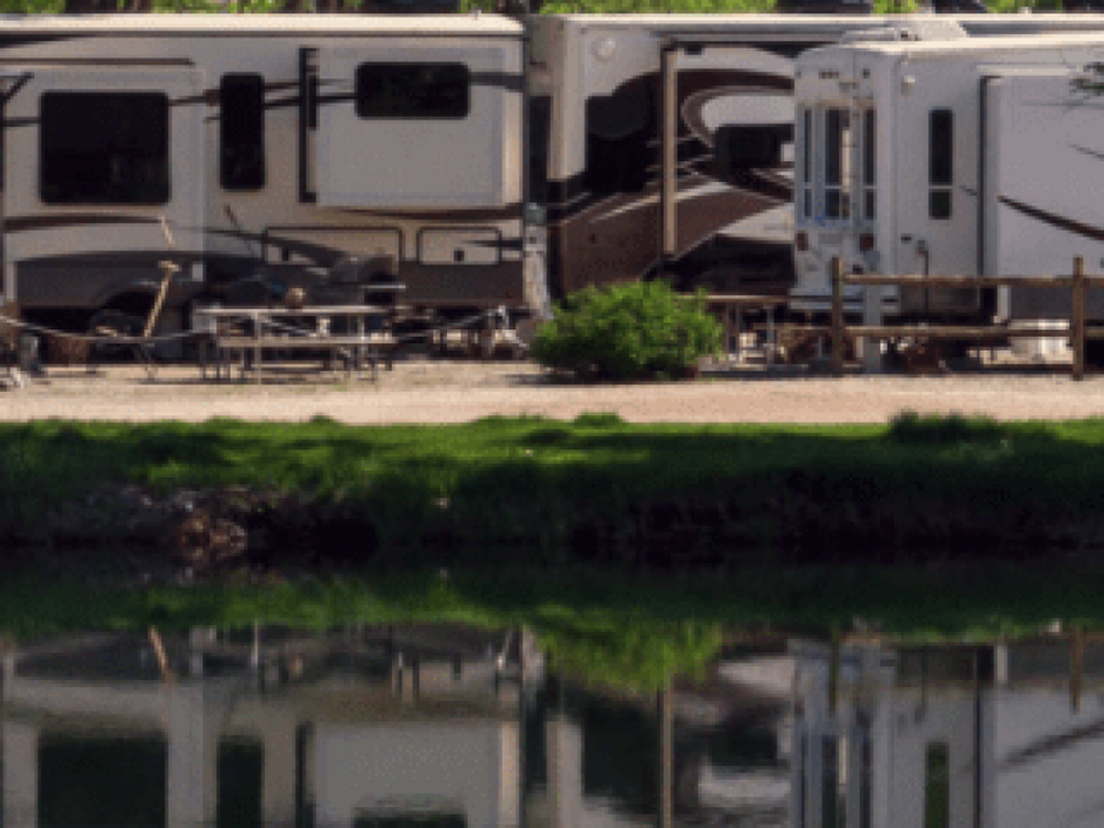 RV at by the water Snug Harbor RV Park & Marina