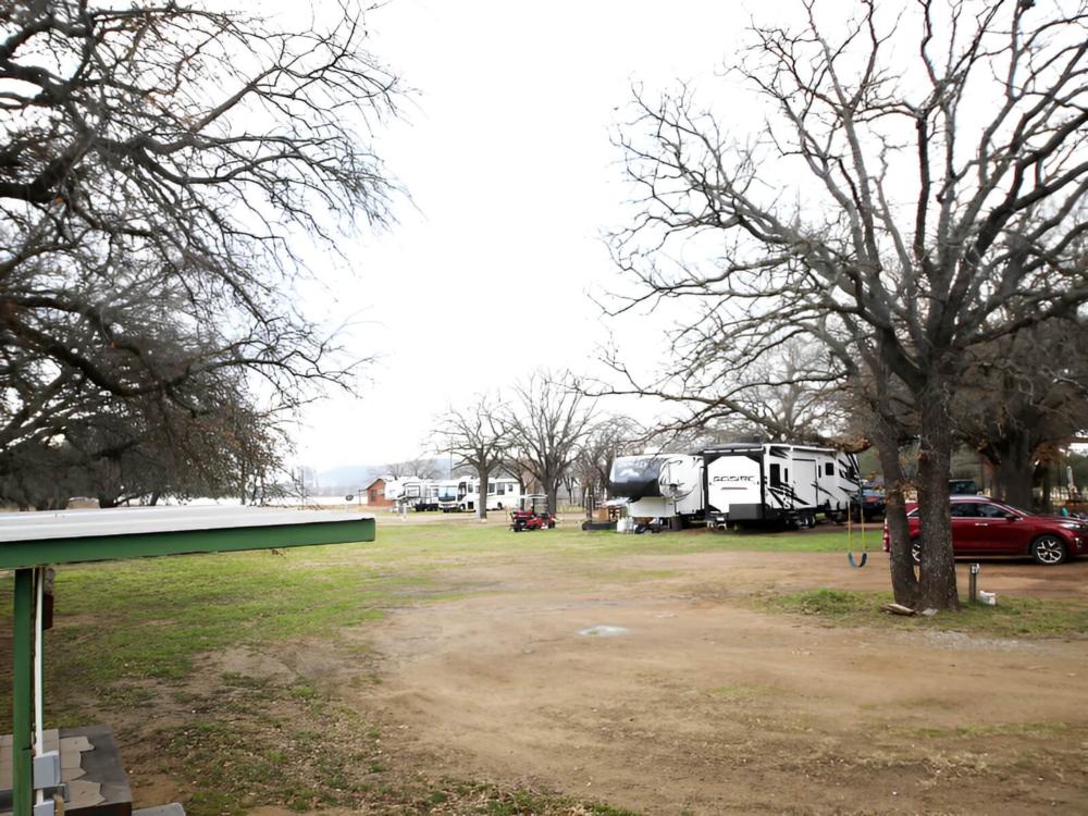 Trailers parked at site Lake Palo Pinto RV Park