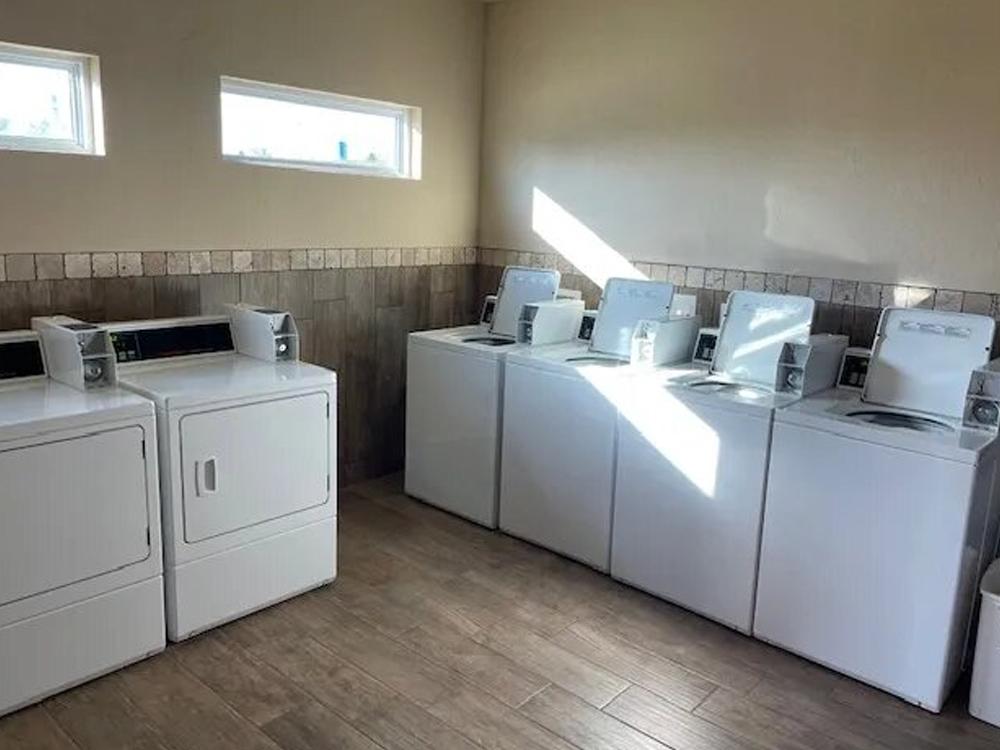 The inside of the laundry room at BEXAR COVE RV PARK
