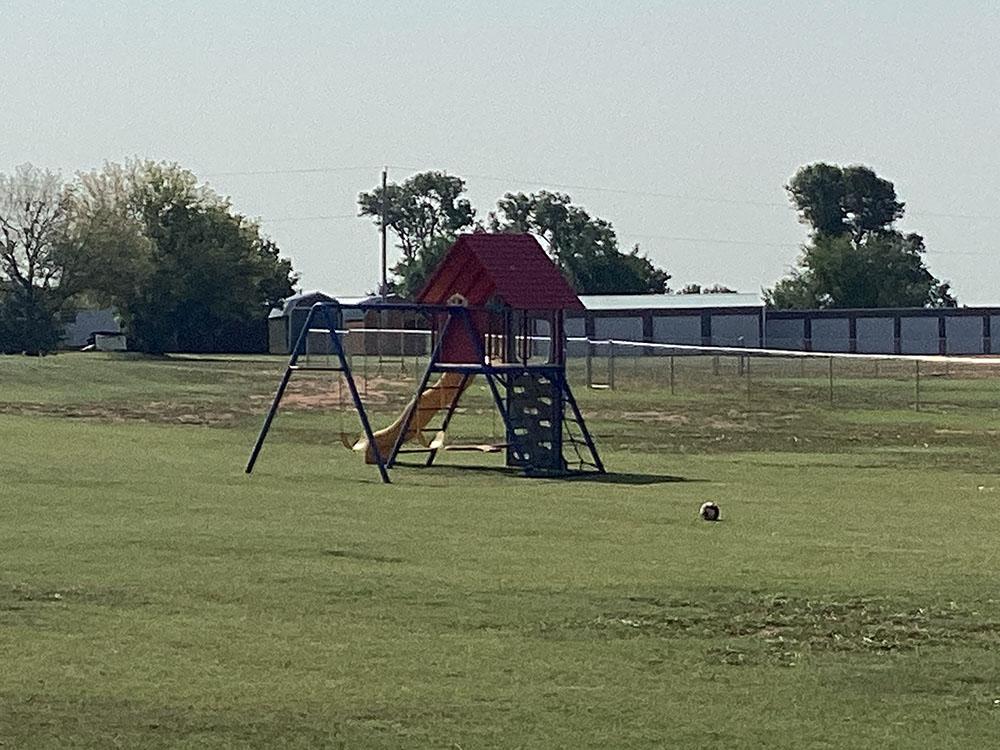 Swing set at BEXAR CAVE RV PARK