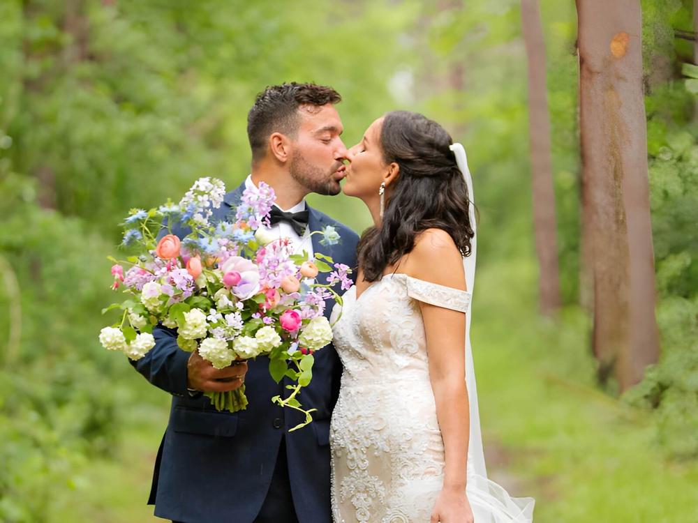 A groom kissing his new bride