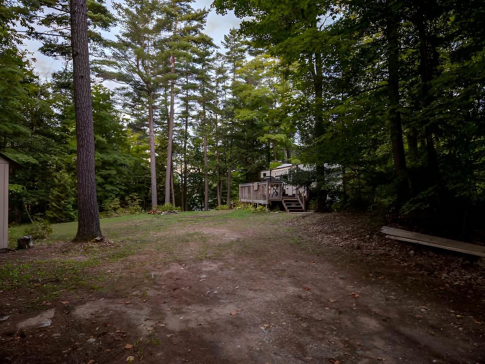 Parked trailer at site Tiny Village Bon Echo