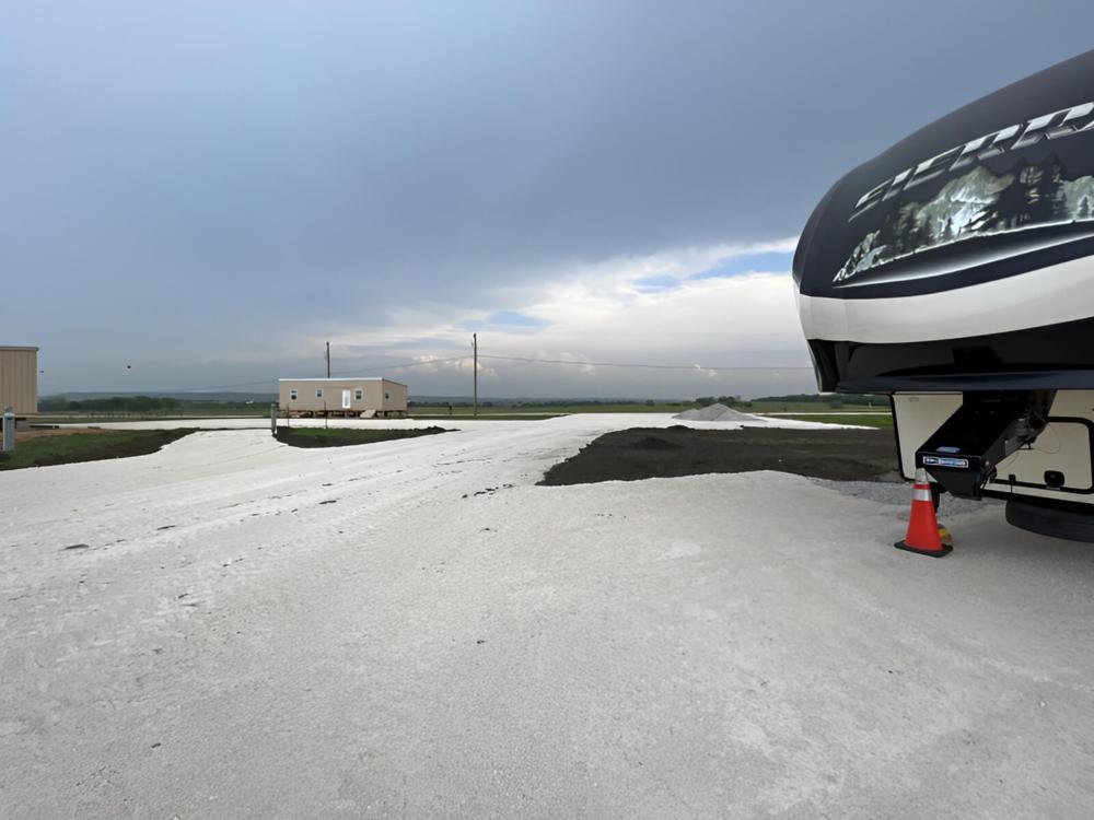 Parked trailer at site Big Country RV Park - Grandview