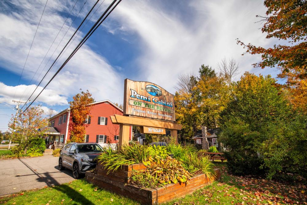 Welcome sign at site Pemi Cabins