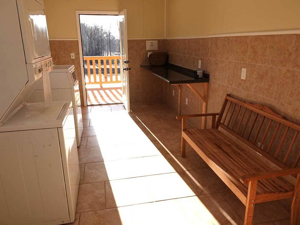 The laundry room with a folding table at THORNHILL RIDGE RV COMMUNITY