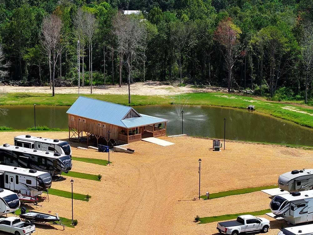 Aerial view of the sites, office and the lake at THORNHILL RIDGE RV COMMUNITY