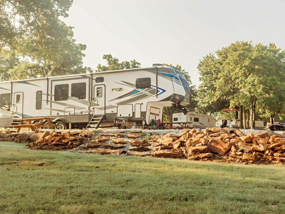 Parked trailer at site Country Dream RV Park