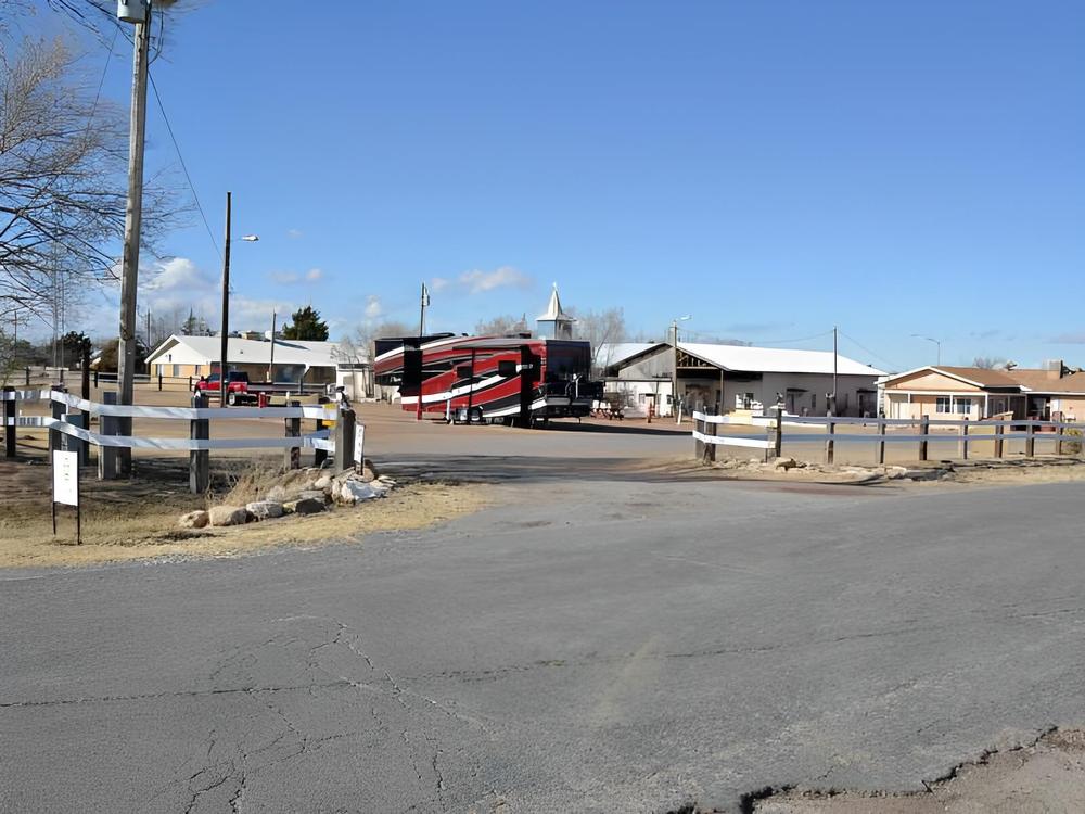Red trailer parked at site