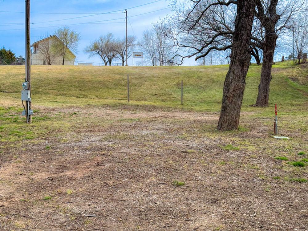 One of the grass sites at RIVERSHIRE RV RESORT & CAMPING