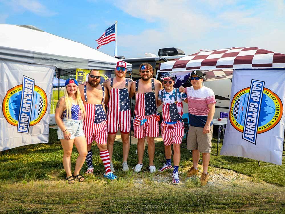 A group of people dressed in clothes designed like the flag at WORLD WIDE TECHNOLOGY RECEWAY CAMPGROUND