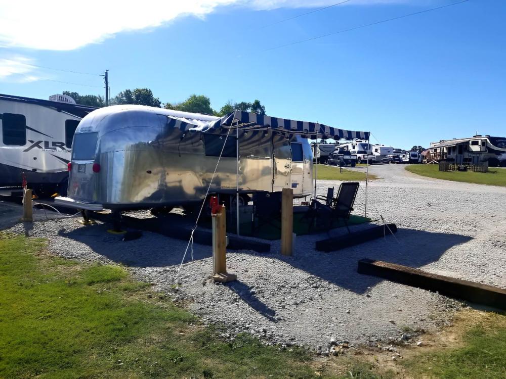 Parked trailer with patio at Rocky Springs RV Ranch