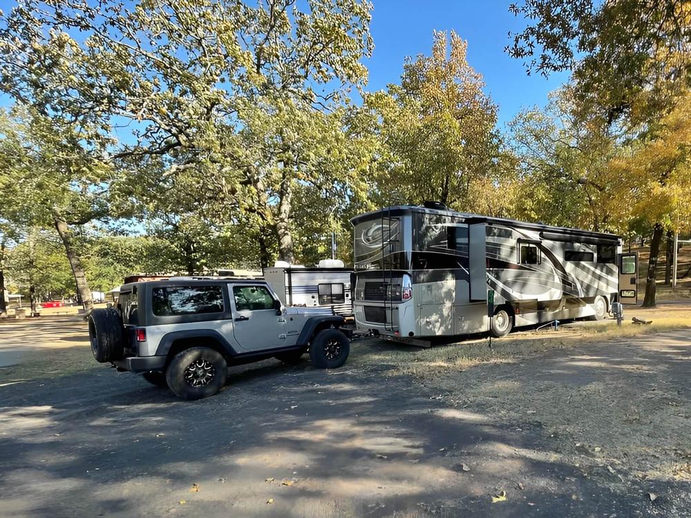 RV towing a jeep at Ohana Celebration Park