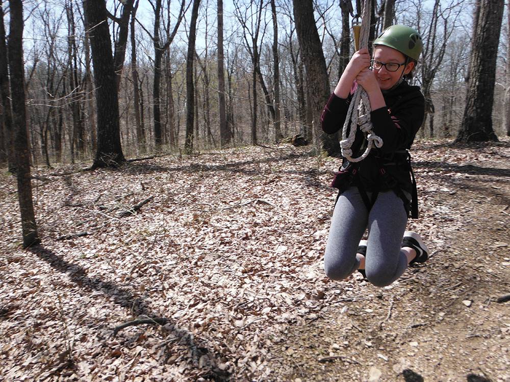 A girl ziplining