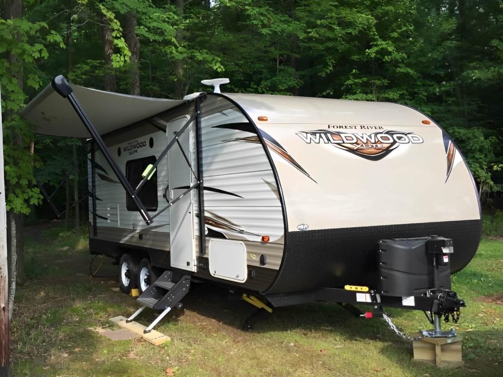 RV in a grass site at Wedges Creek Hideaway
