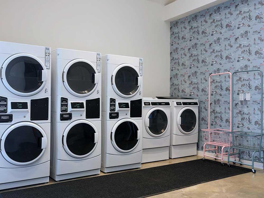 The washers and dryers in the laundry room at GATHER CAMPGROUND BELL COUNTY