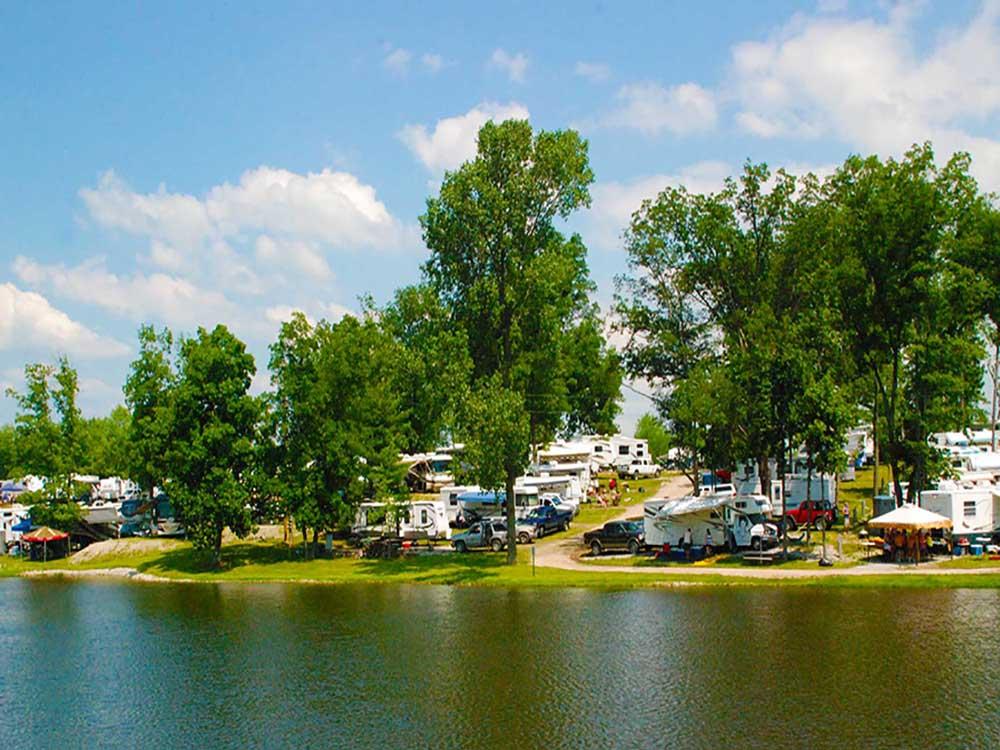 Trailers parked by the water at HICKORY HILL LAKES CAMPGROUND