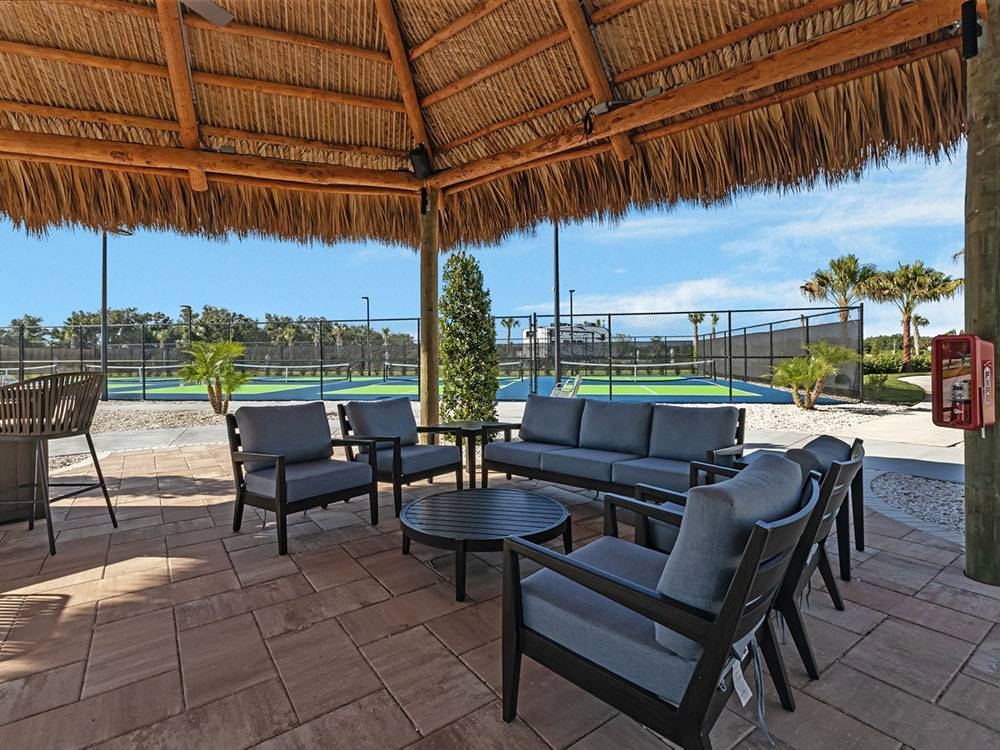 Covered outdoor seating area at Southern Sands RV Resort