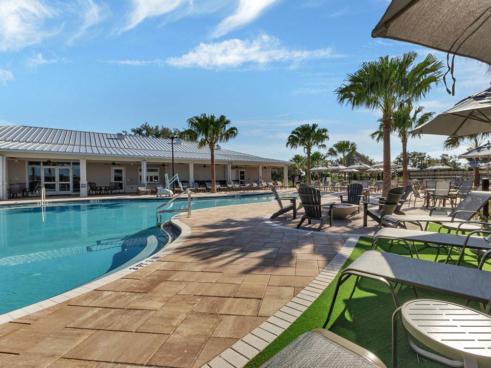 Poolside chairs at Southern Sands RV Resort