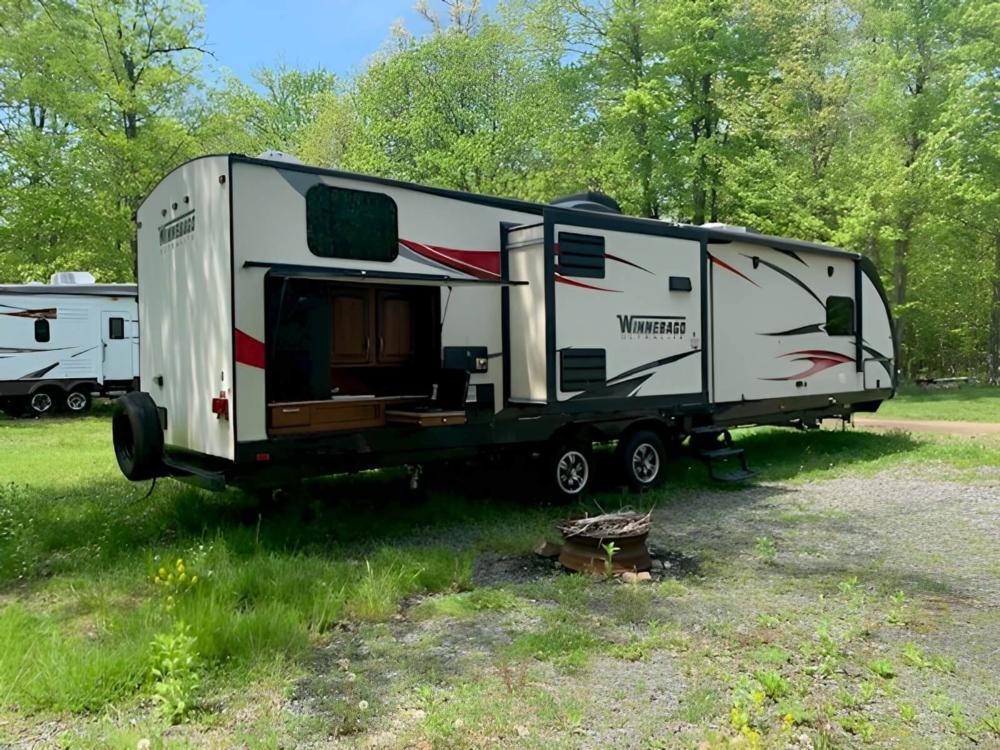 Parked trailer at site Sterling/Lake Ontario KOA Holiday