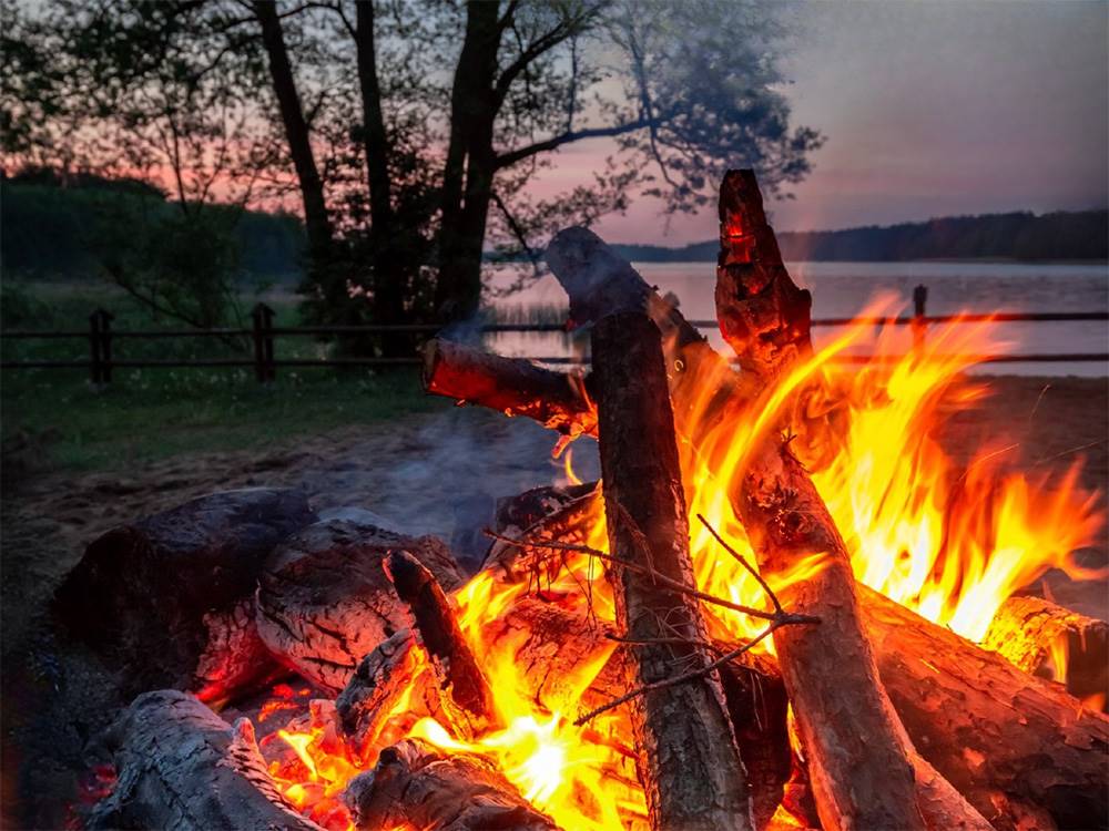 A fire pit near the water