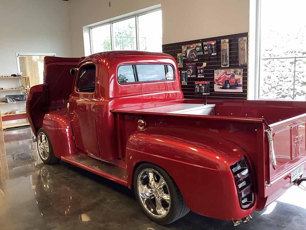 A red hot rod truck at HOT ROD HILL RV PARK